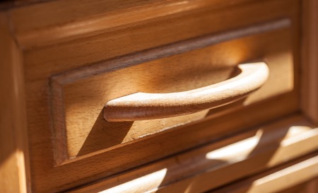front of handle pull-out furniture drawer closeupの写真素材