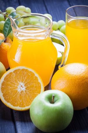 fresh fruit and juice in the jug vertical photo still lifeの写真素材