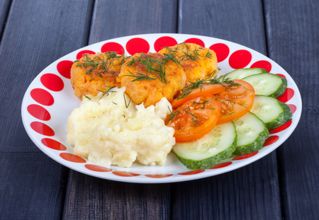 carrot cutlets with mashed potatoes and vegetables, finished dish menuの写真素材