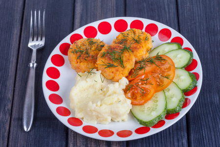 carrot cutlets with mashed potatoes and vegetables, finished dish menuの写真素材