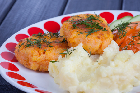 carrot cutlets with mashed potatoes and vegetables, finished dish menuの写真素材