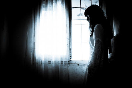 Horror scene of a scary womanの写真素材