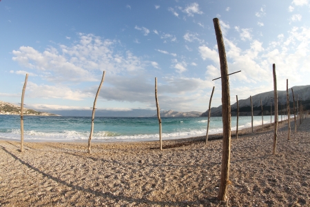 waves sweep across the beachの写真素材