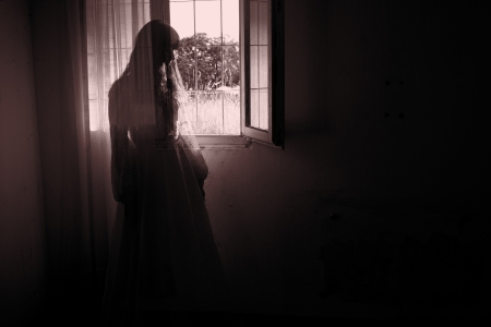 Horror Scene of a Creepy Woman in the Wedding Dressの写真素材