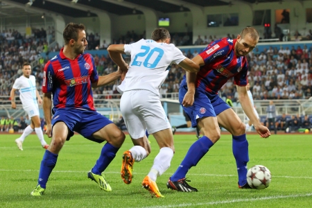 RIJEKA, CROATIA SEPTEMBER 28  soccer derby match NK Rijeka  white  vs  NK Hajduk  blue-red  on September 28, 2013 in Rijeka のeditorial素材