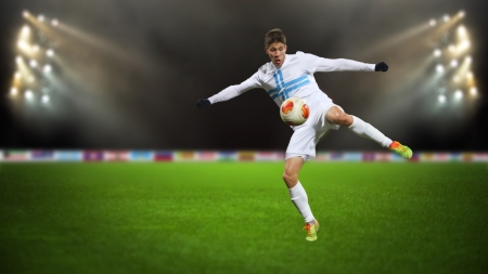 Soccer player in the actionの写真素材
