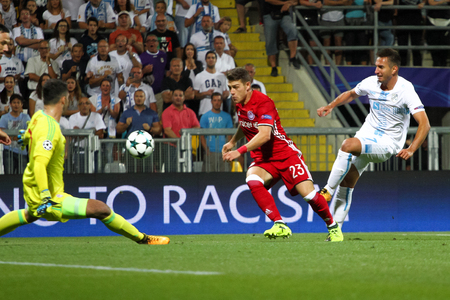 RIJEKA, CROATIA - August 22, 2017:  Mario Gavranovic of Rijeka against the goalkeeper of Olympiacos Stefanos Kapino during the UEFA Champions League play-off match between HNK Rijeka and Olympiacos FC at HNK Rijeka Stadiumのeditorial素材