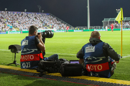 RIJEKA, CROATIA - August 22, 2017:  photo journalist at UEFA Champions League play-off match between HNK Rijeka and Olympiacos FC at HNK Rijeka Stadiumのeditorial素材