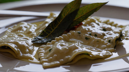 Rich onion soup with melted cheese in ceramic bowl closeup of classic dish winter comfort golden broth onionsの写真素材