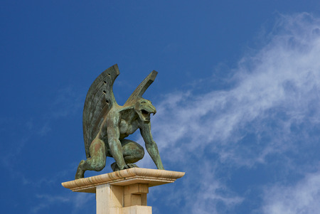 guardian gargoyle over Pont del Regne of bridge of the kingdom. Valencia. Spainの写真素材