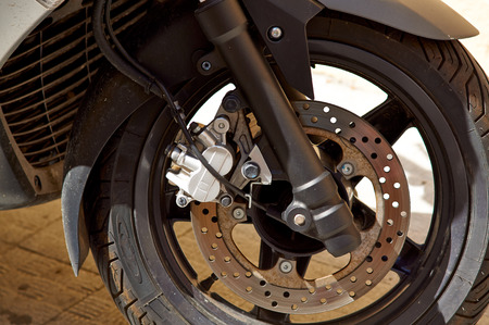 Part of the large black motorcycle closeup