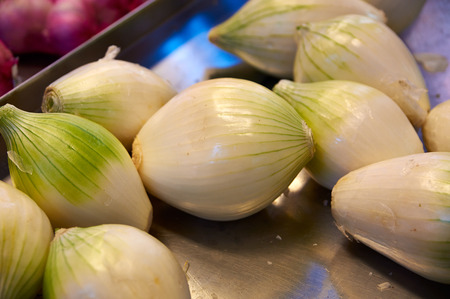 Onions big Golden on the counter marketの写真素材