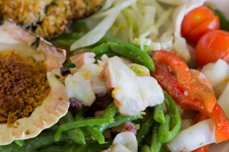 Sushi sea food in the restaurant close up. King prawns, seaweed and caviar for gourmets. Japanese and Chinese cuisine.の写真素材
