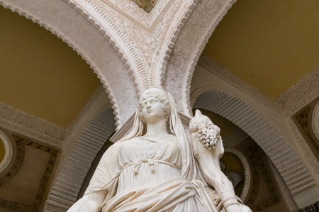 Historic buildings and monuments of Seville, Spain. Architectural details, stone facade and museums Europe. Spanish architectural styles of Gothic. Statue. marble head and bas-reliefのeditorial素材