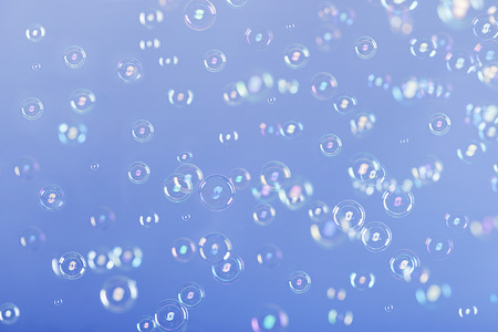 Soap bubbles on a blue background