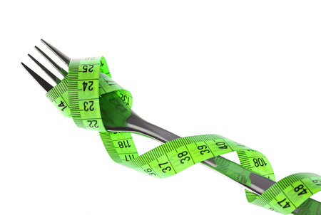 Tape measure on a forkの写真素材