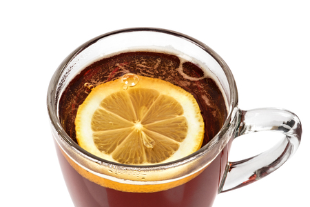 Cup of tea with lemon isolated on white backgroundの写真素材