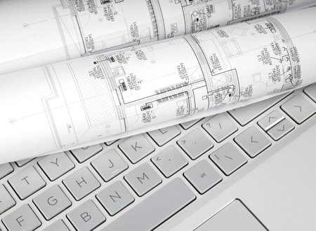 High angle view on the plan of electrical installation on computer keyboardの写真素材