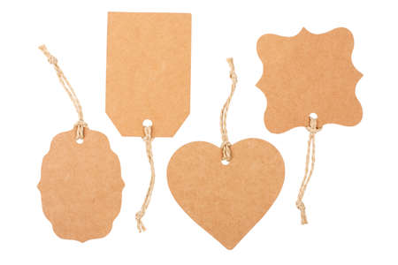 Brown paper label tags with rope isolated on white backgroundの写真素材