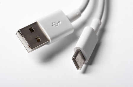 White USB Type-C charger cable on white backgroundの写真素材