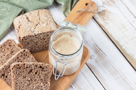 Flour starter for making natural fermented bread from spelt flour. The concept of proper nutrition.の写真素材