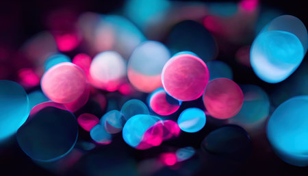 Bubble pattern neon background. bokeh glow. Blur pink blue color circles floating artwork design on dark black abstract art illustration.の素材