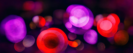 Neon light abstract background. bokeh light. Blur fluorescent purple red color flare circles ornament on dark black decorative art illustration.の素材