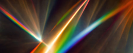 rainbow rays. digital flare. Graphic background. Colorful blurred glowing lights reflection laser effect shining on dark backdrop.の素材