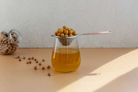 Aquafaba chickpea plum, egg change, vegan cuisine concept, natural organic products.の写真素材