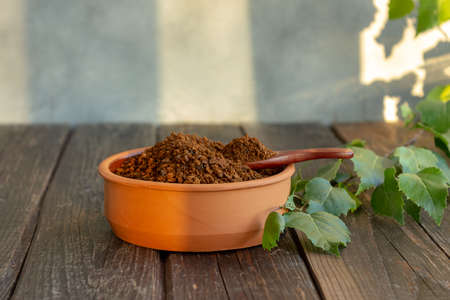 Chopped chaga for brewing tea. Organic drink, antioxidant. Selective focusの写真素材