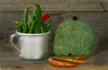 still life with vegetables: Chili and Brussels sproutsの写真素材