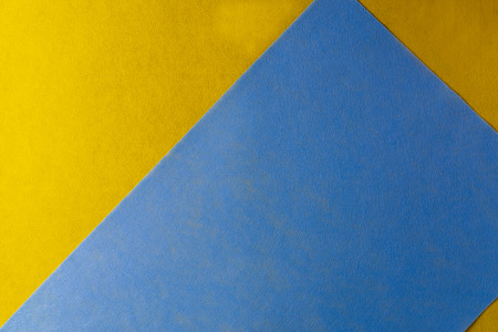 Multi colored abstract paper of pastel colors, with geometric shape, flat lay.の写真素材