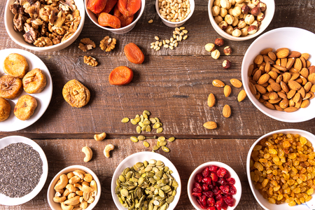 Top view the set of Superfoods in Bowls on wooden brown Background and copy space.の写真素材