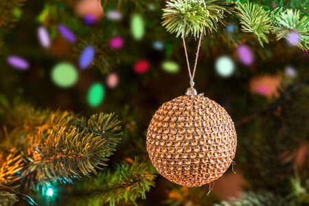 Christmas and New year concept. Christmas and new year decorations over fesrive new year tree background.の写真素材