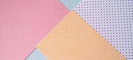 Multi colored abstract paper of pastel colors, with geometric shape, flat lay.の写真素材
