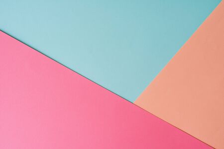 Multi colored abstract paper of pastel colors, with geometric shape, flat lay.の写真素材