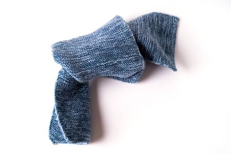 Classic blue color of the year 2020 concept. Flat lay Knitted Woolen textured Clothes toned in trendy classic blue color isolated on white background.の写真素材