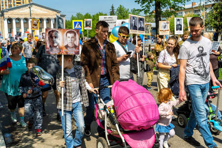 Zhukovsky,RUSSIA,MAY 9,2019: Immortal regiment on Victory Day the 9th of May, when people go column and carry banners with portraits of their relatives who participated in the great Patriotic war.のeditorial素材