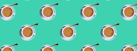 Seamless Pattern made with coffee cups on green background,panorama.の写真素材