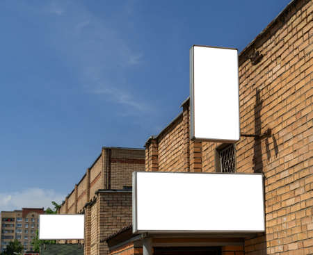 Billboards with white isolated space for advertising and posters on city streets.の写真素材