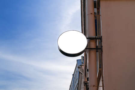 Circle Billboard with white isolated space for advertising and posters on city street.の写真素材