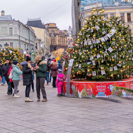 Moscow, Russia - December 28, 2019: Christmas and New Year decoration and walking people in the center of the city.のeditorial素材