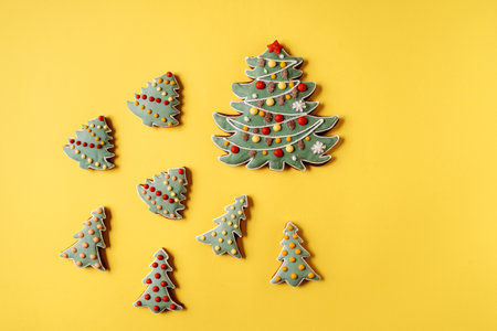 Christmas Gingerbread on gray background. Fir tree shape, flat layの写真素材