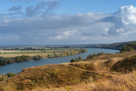 Russian Oka river before sunset on a clear autumn day under dramatic sky