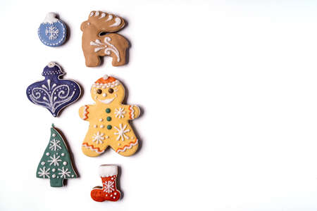 Christmas Gingerbread isolated on white background. Snowflake, spruce, star, cone, star, bell shape Flat lay.の写真素材