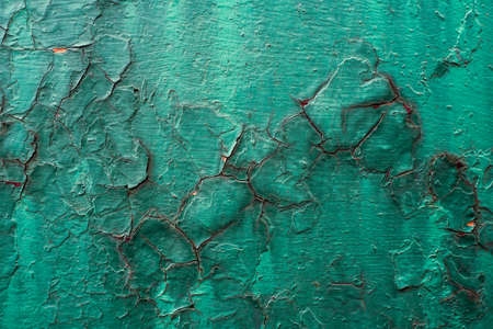 Multicolored background with rough rust texture on metal surface.の写真素材