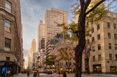 New York - October 28, 2015: Crowd of people and street signs in Manhattan, New York, usa.のeditorial素材