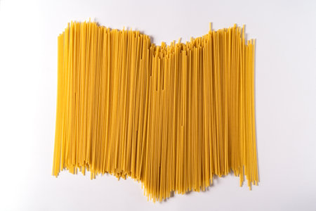 Pasta, spaghetti on a white background top view ,flat lay with copy space.の写真素材