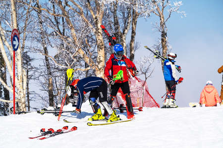 March 14, 2022, Mountain Air, Yuzhno-Sakhalinsk, Russia : skiers in the slopes of the skiing resort.のeditorial素材