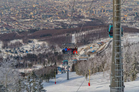 March 13, 2022 ,Mountain Air Resort, Yuzhno-Sakhalinsk, Russia : aerial view Ski lift from the mount Bolshevik.のeditorial素材